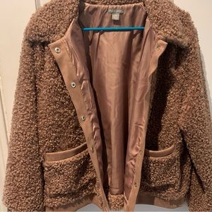 Woman’s Falls Creek lined, button up front cozy jacket.